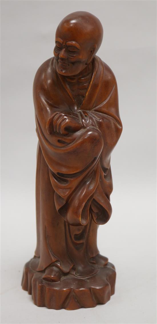 A Chinese boxwood standing figure of Luohan, 23.5cm